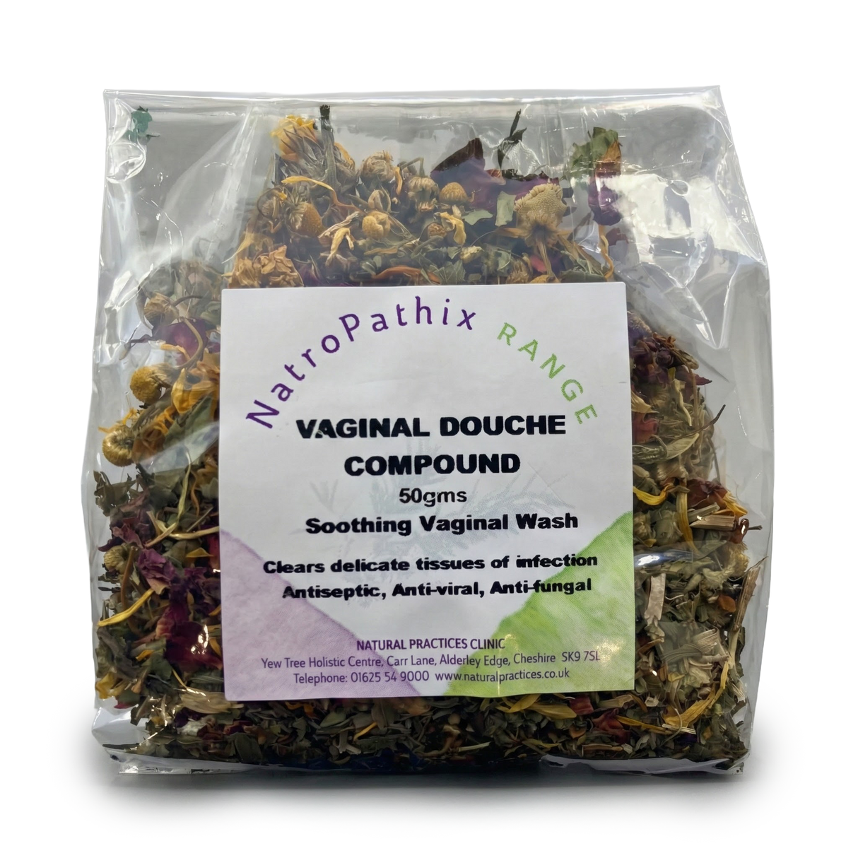 A clear bag of Vaginal Douche Compound - 50gms contains dried herbs with labeled product info, specially formulated for anti-bacterial support and vaginal health.