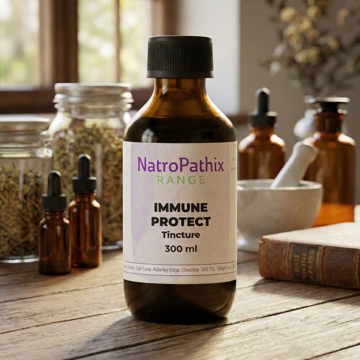 A bottle labeled "Immune Protect Tincture - 200/300ml" sits on a wooden table with herbs, jars, and elderberry, highlighting natural immune support ingredients such as echinacea.