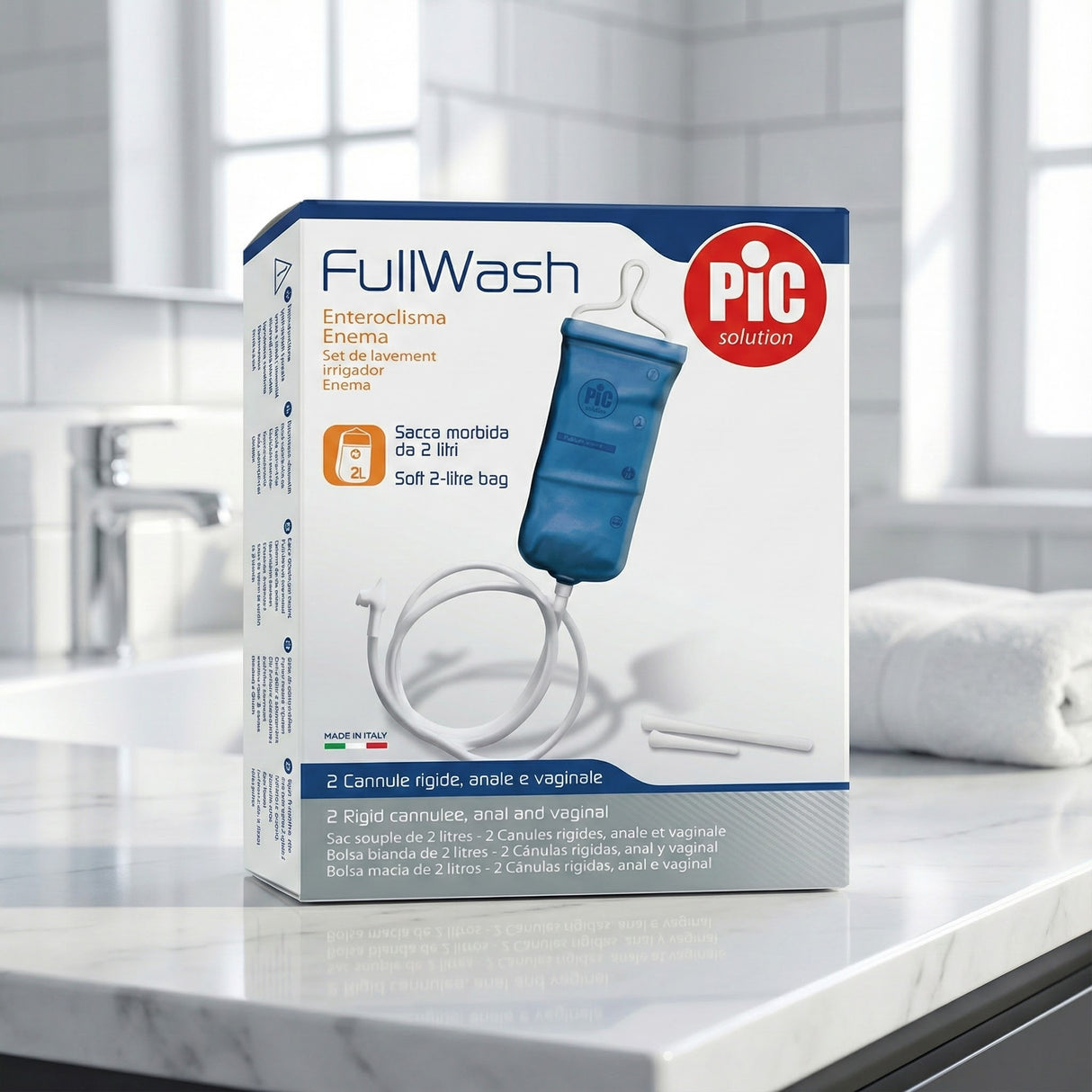 A box of Enema Kit - Vaginal / Anal Cleansing rests on a bathroom counter with a blurred sink in the background, perfect for rectal enema or vaginal cleansing.