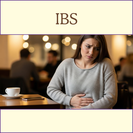 A woman in a cafe holding her stomach in discomfort, with "IBS" text above her.