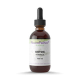 A brown dropper bottle labeled "Detox Formula - 100ml" sits on a white background, featuring an herbal tincture formulated for liver and gall bladder support.
