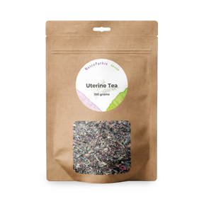 Brown resealable bag labeled "Uterine Tea - 100gms" features a clear window displaying loose herbal tea, carefully blended to support uterine health and women’s wellness.