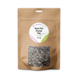 Brown resealable pouch labeled "Beat-The-Slump Tea - 100 gms" contains loose herbal tea for natural energy, visible through a clear window.