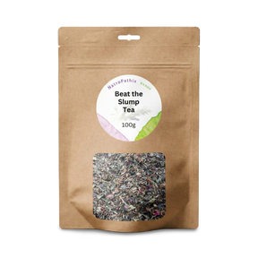 Brown resealable pouch labeled "Beat-The-Slump Tea - 100 gms" contains loose herbal tea for natural energy, visible through a clear window.