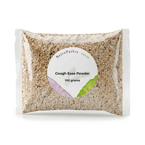 A clear plastic packet labeled "Cough-Ease Powder - 100g" contains light brown granules, a herbal remedy known for effectively relieving dry cough.