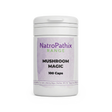 White bottle labeled "Mushroom Magic - 100 Medicinal caps" with a light purple label on a plain background, formulated with medicinal mushrooms for immune support.