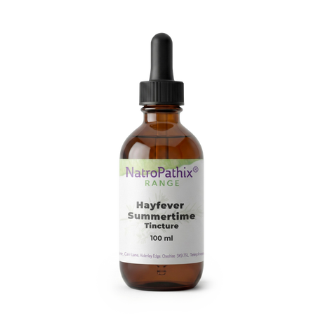 A brown dropper bottle labeled "Summertime Tincture - 50ml" sits on a white background, providing a natural antihistamine solution for hayfever relief.