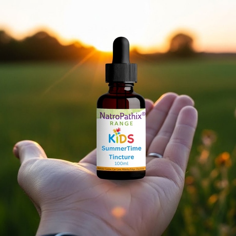 Kids SummerTime Tincture in hand outdoors